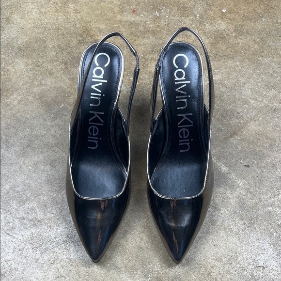 Calvin Klein Shoes - Calvin Klein Metallic Slingback Heels
Size: 9